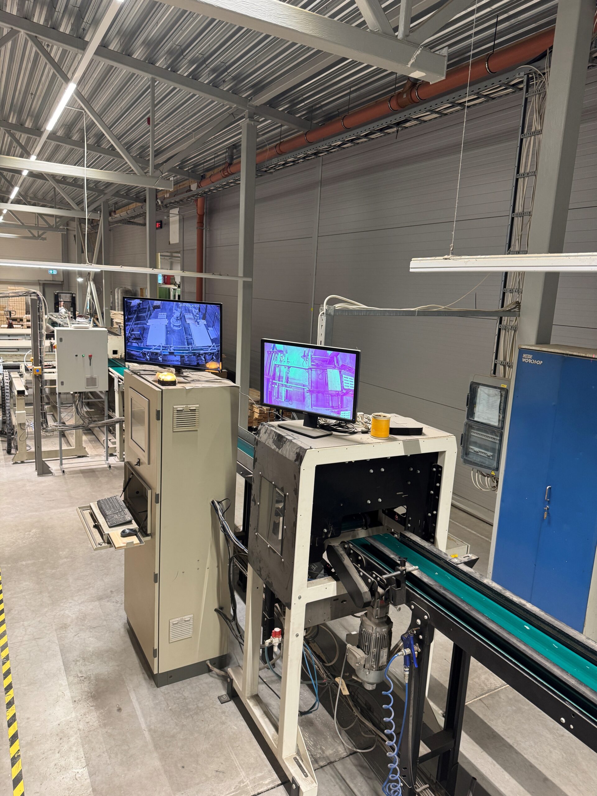 AI scanner sorting timber quality at the Tiksoja factory